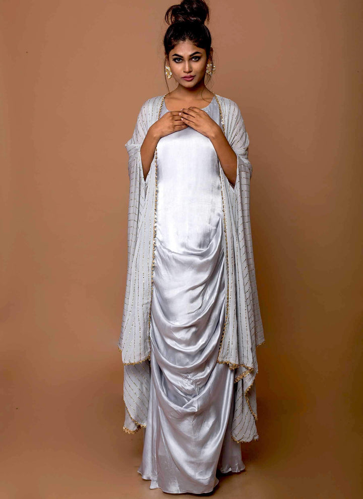 Sky Blue Cowl Dress With Mukesh Cape Standing